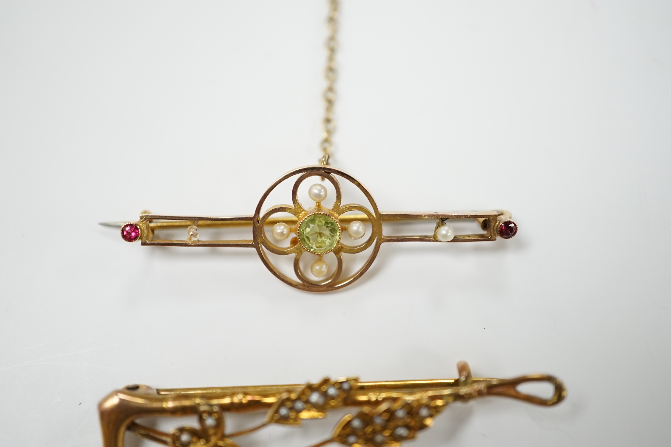 A modern 9ct gold, turquoise and diamond set bar brooch, 69mm and two Edwardian 9ct and gem set bar brooches, including seed pearl set riding crop and spray brooch, gross weight 14.1 grams.